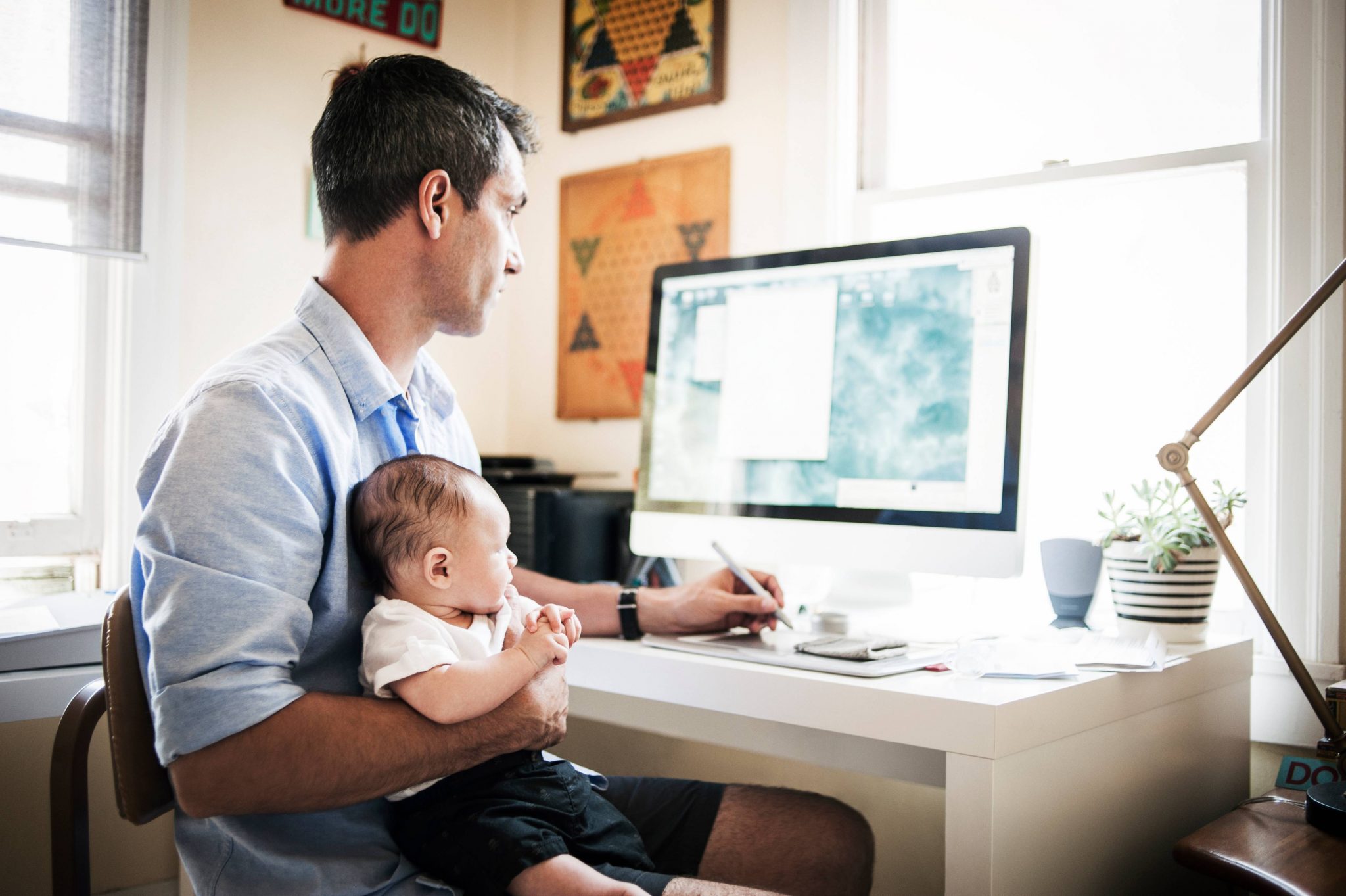 Father sit. Папа в офисе. Work father. Working at Home. Man carrying Baby.